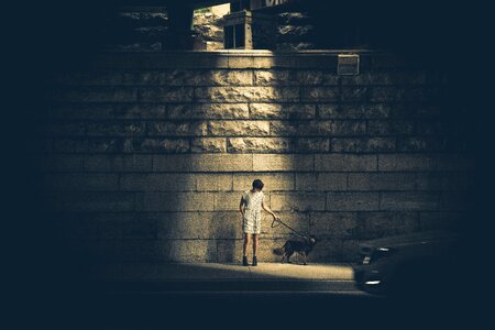 Woman Walking Dog Night photo