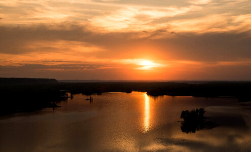Orange Sunset over the Mississippi photo