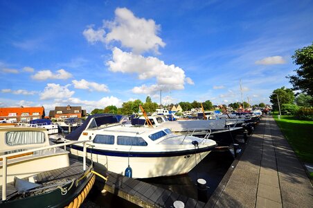 Blue Sky boat canal photo