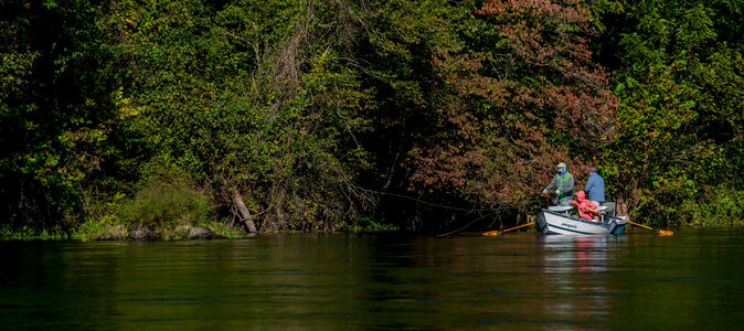 Group fishing in drift boat on White River-1 photo