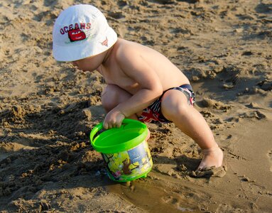 Sand kid sandy beach photo