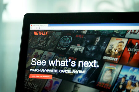 Watch movies! Netflix app on Laptop screen photo