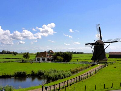 Clouds windmill house photo