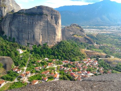 The buildings and huge rock mountains, Greece photo