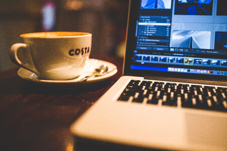 Coffee and MacBook Pro photo