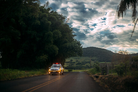 Road with police car in the landscape photo