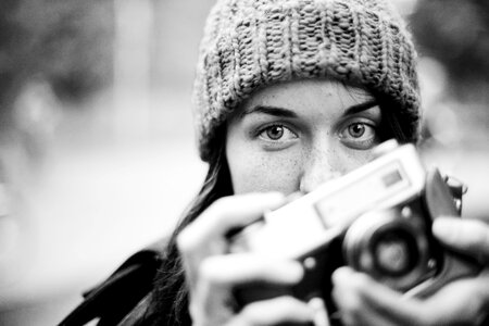 Girl Using Camera photo