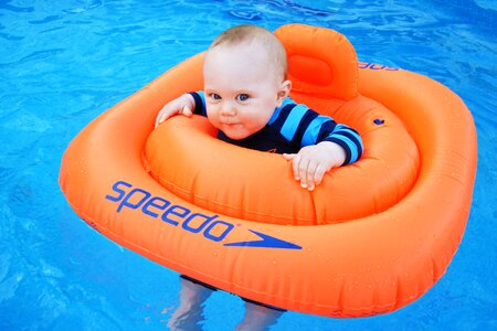 Baby swimming little photo