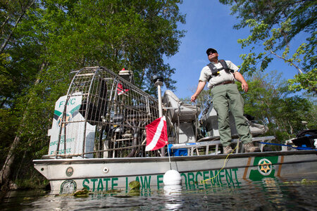 Biologist monitors aquatic plants-2