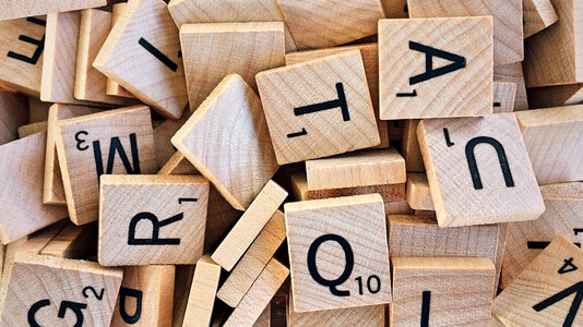 Scrabble Letters in a pile photo