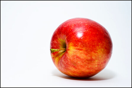 A Red Apple Isolated On A White Background