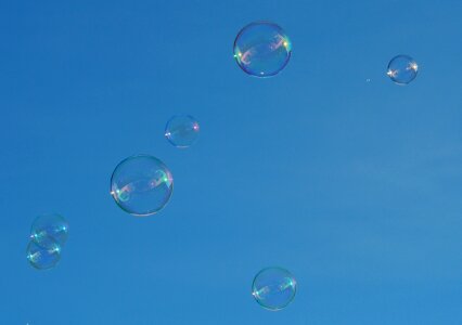 Soapy water make soap bubbles float