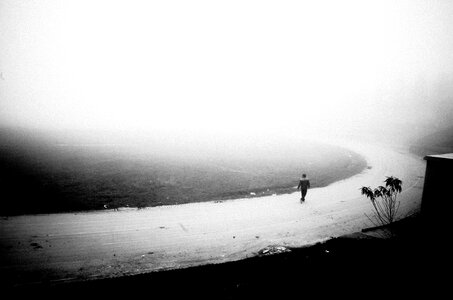 Watching on the track black and white photo