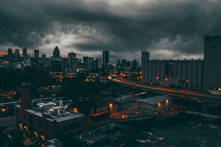 Black Clouds over the Night Time Cityscape of Montreal, Quebec, Canada photo