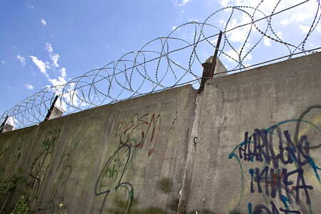 Barbed wire wall