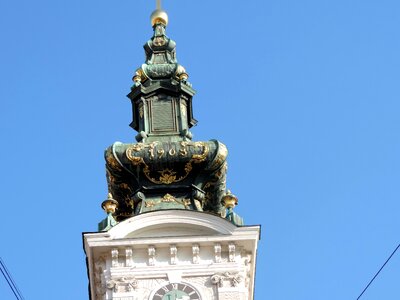Baroque church tower cross photo