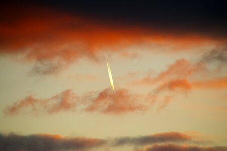 Contrail sunset clouds photo