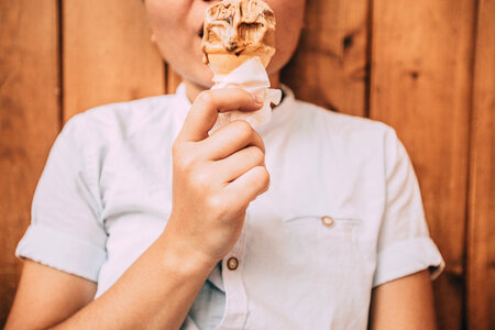 Boy with a Melting Ice-cream in his Hand photo