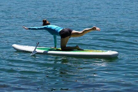 Surfboard standing board lake photo