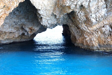 Cave cliff beach photo