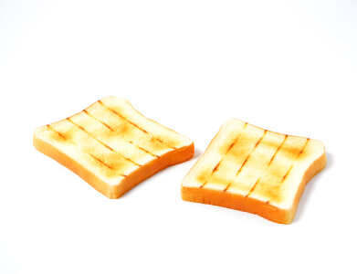 slices of bread on a white background photo