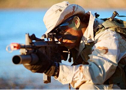 Us Soldier In Defensive Position photo