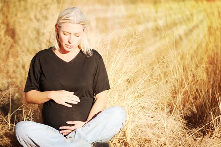 Pregnant nature mom