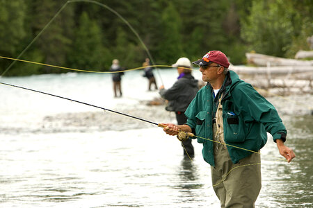 Adults fly fishing photo