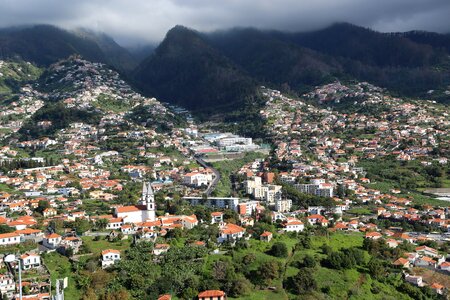 Mountain landscape and cityscape in Madeira, Portugal photo