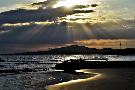 Beautiful sunrise cloudscape over ocean background photo