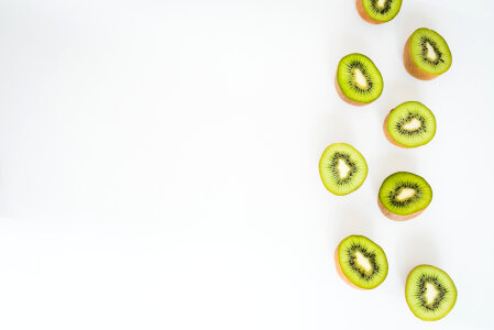 Sliced Kiwi Fruit on White Background photo