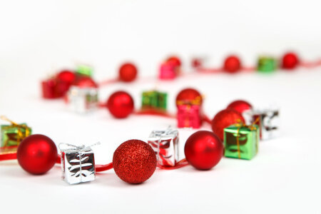 A curve created with baubles and presents