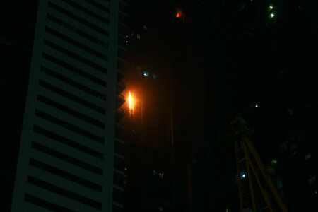 2 Fire in the torch building in dubai photo