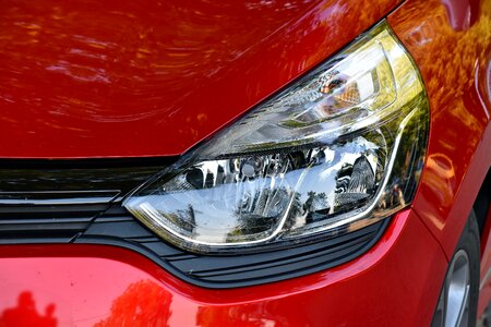 Car headlight hood