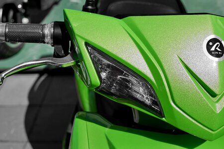 Headlight steering wheel vehicle