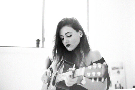 Young Woman Playing Guitar photo