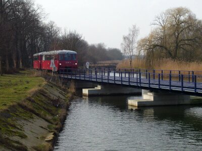 Train on bridge photo