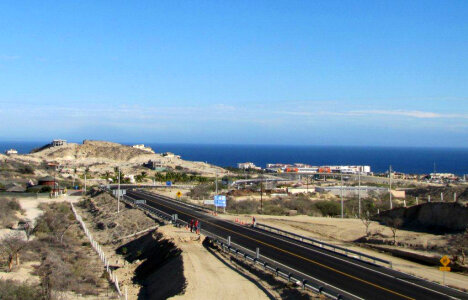 Road and town and ocean in Baja California photo