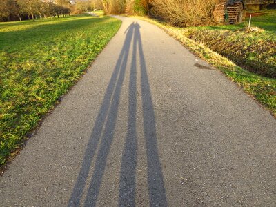 Human long shadow sun photo