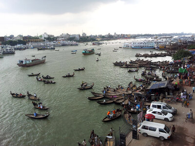 Buriganga River with lots of Boats in Dhaka, Bangladesh photo