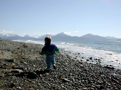 Boy running strand