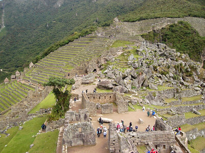 Tourists visiting the Ruins of Machu Picchu, Peru photo