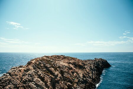 Rocky Cliff In Ocean photo