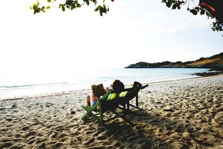 Woman Beach Reading Book Sand photo