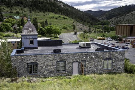 Look at the building and the landscape on the hill in Helena photo