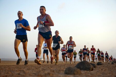 Marathon running race people competing in fitness photo