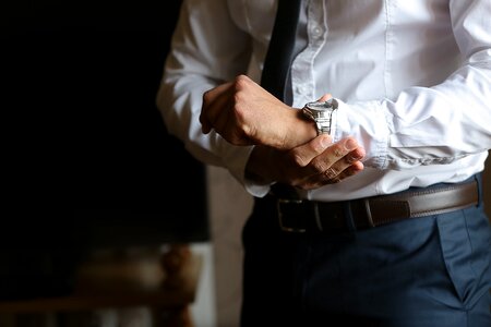 Businessman wristwatch suit