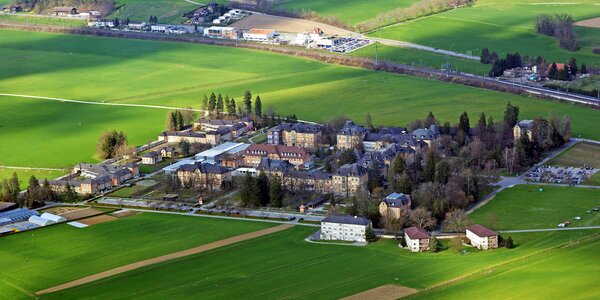 Buildings fields grass photo