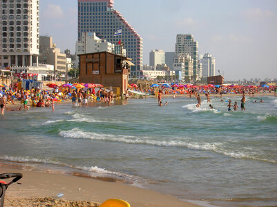 People on Tel-Aviv Beach in Israel photo