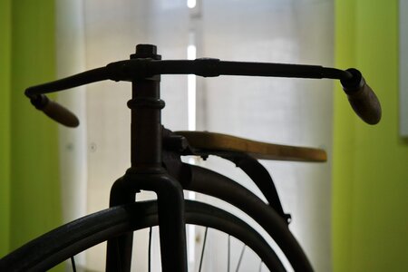 Antiquity bicycle cast iron photo